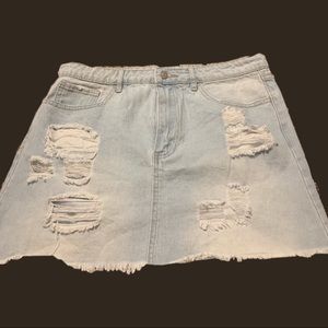 Light washed distressed denim skirt